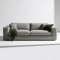 Jasnoszara sofa trzyosobowa z tkaniny bouclé 220 x 95 x 85 cm
