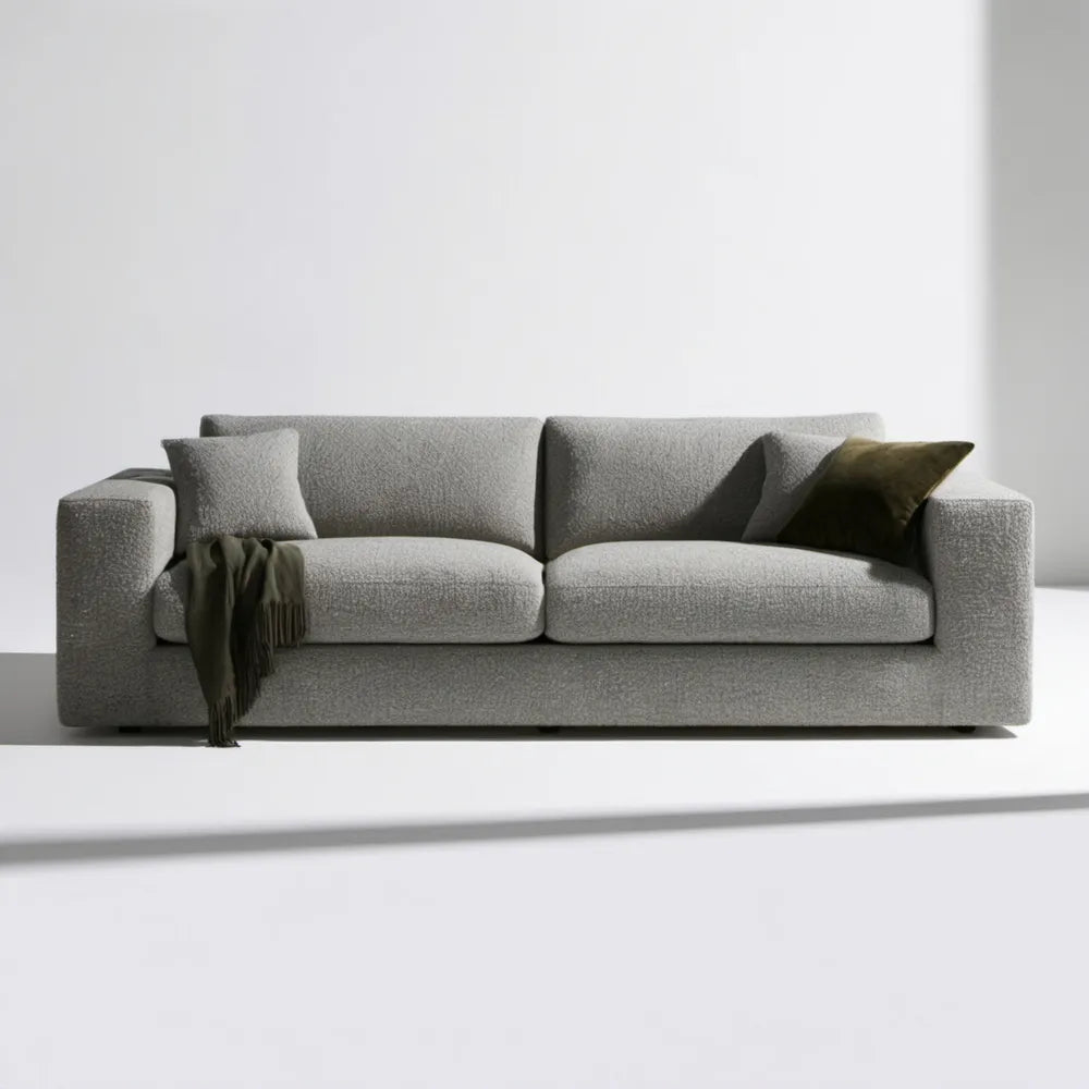 Jasnoszara sofa trzyosobowa z tkaniny bouclé 220 x 95 x 85 cm